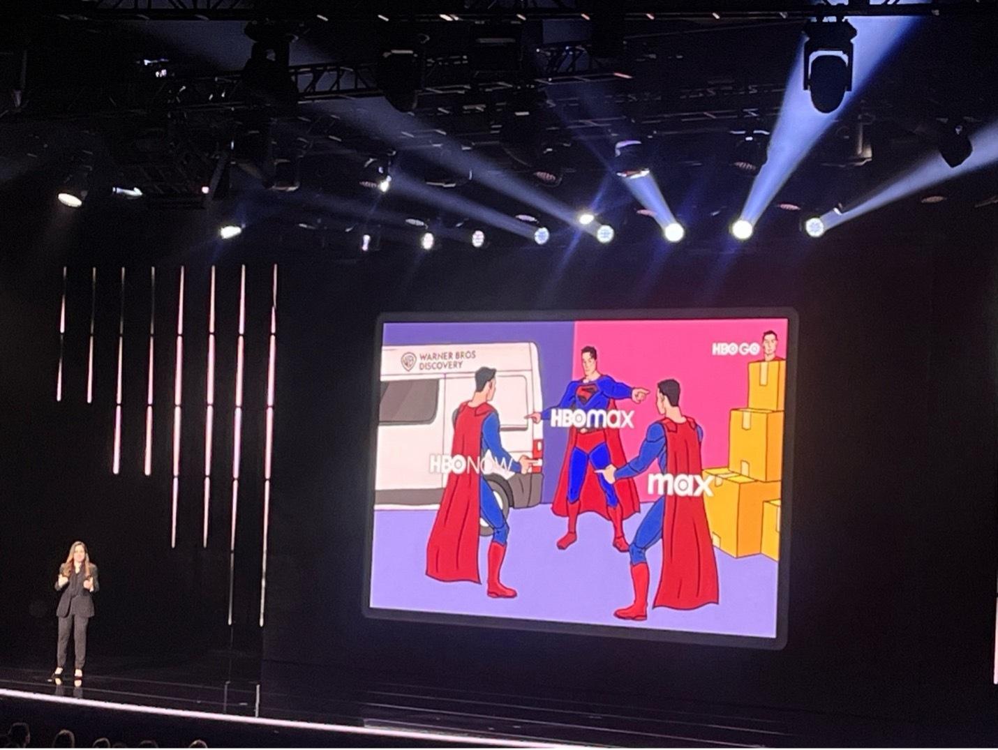 Photo shows on stage of a Spiderman meme with different HBO logos.