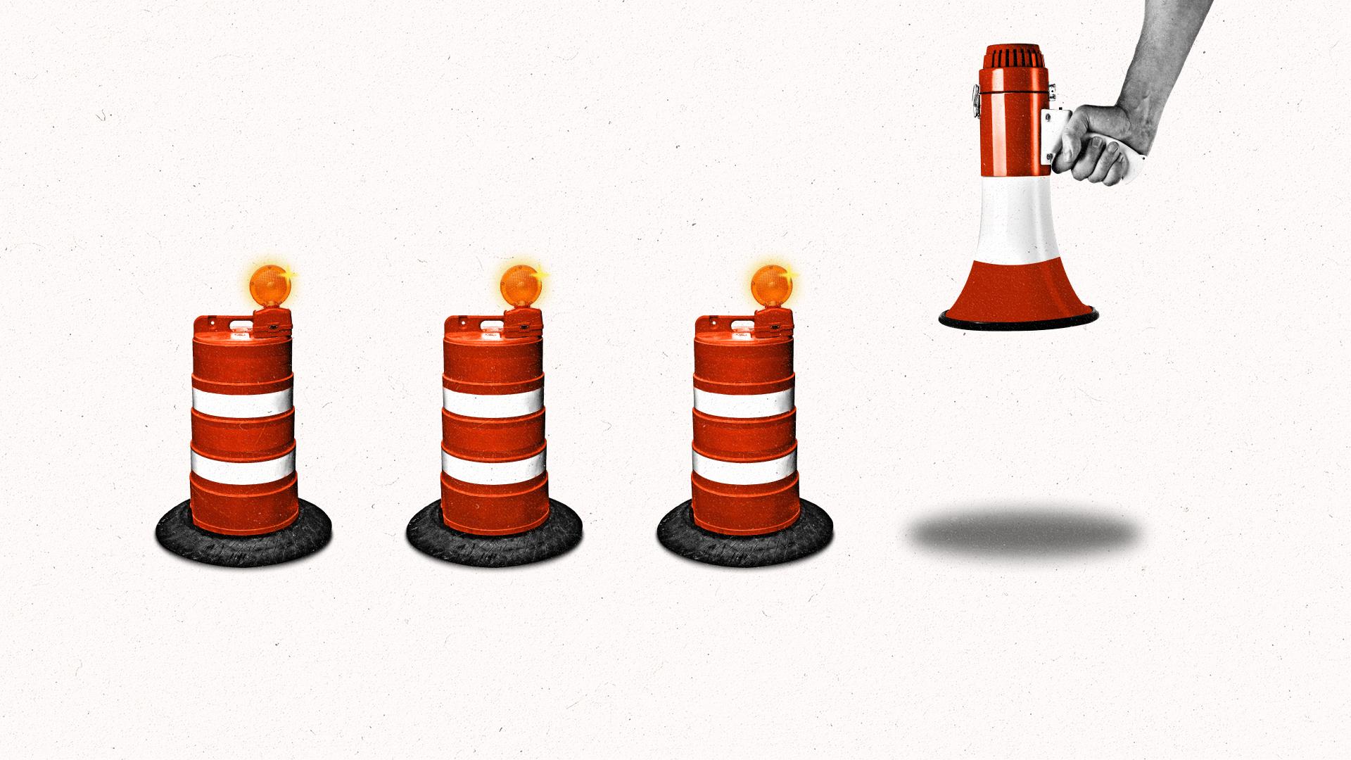 Traffic cones in a row with a hand holding a megaphone that looks like a traffic cone.