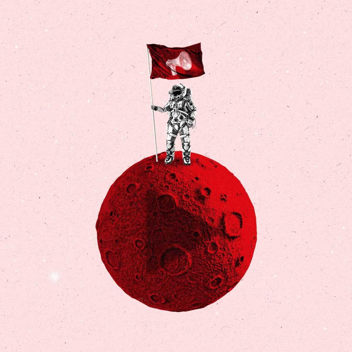 An astronaut holding a flag with a megaphone on it stands on a small, red planet.