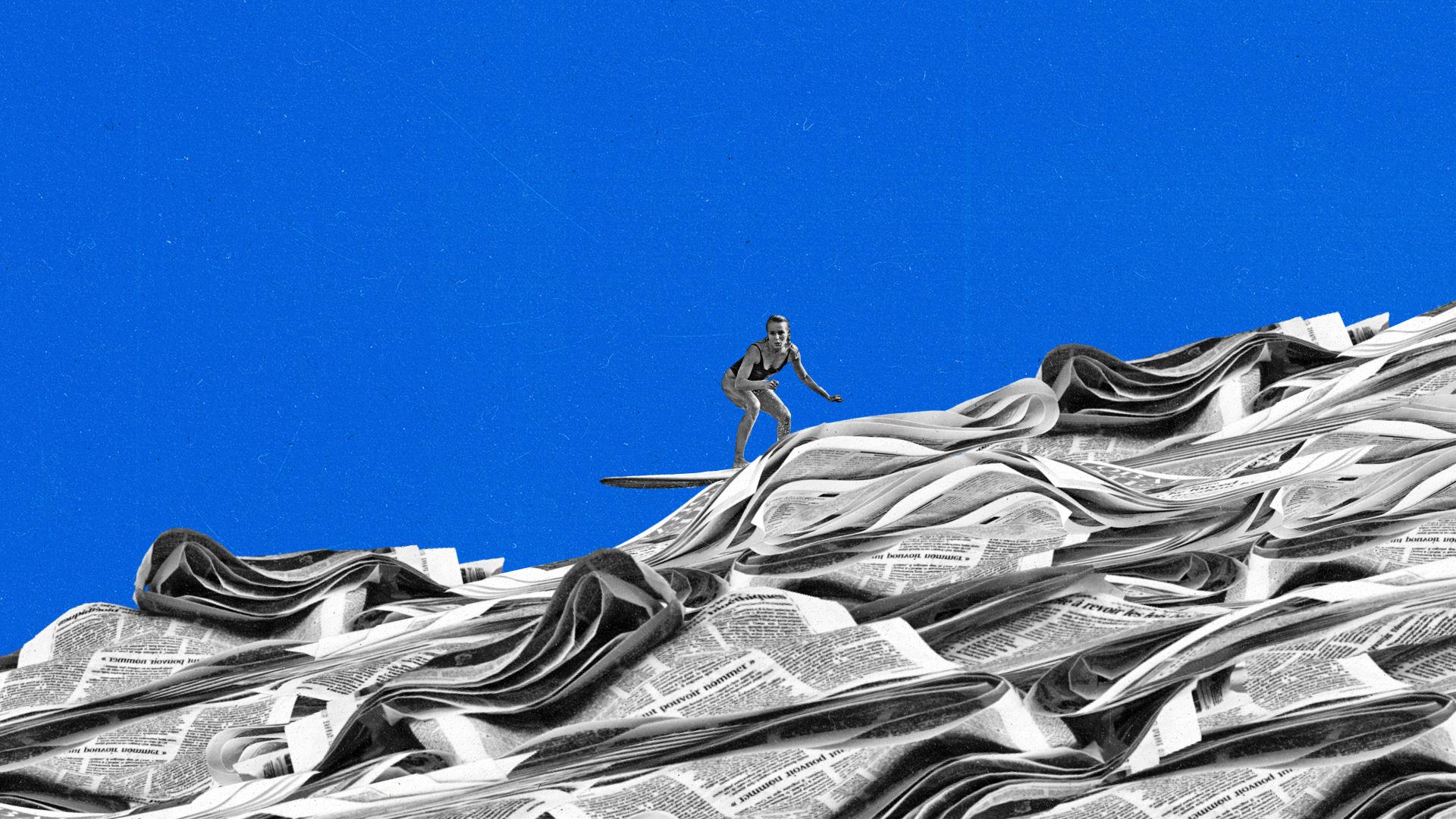 A surfer rides a wave made out of newspapers.