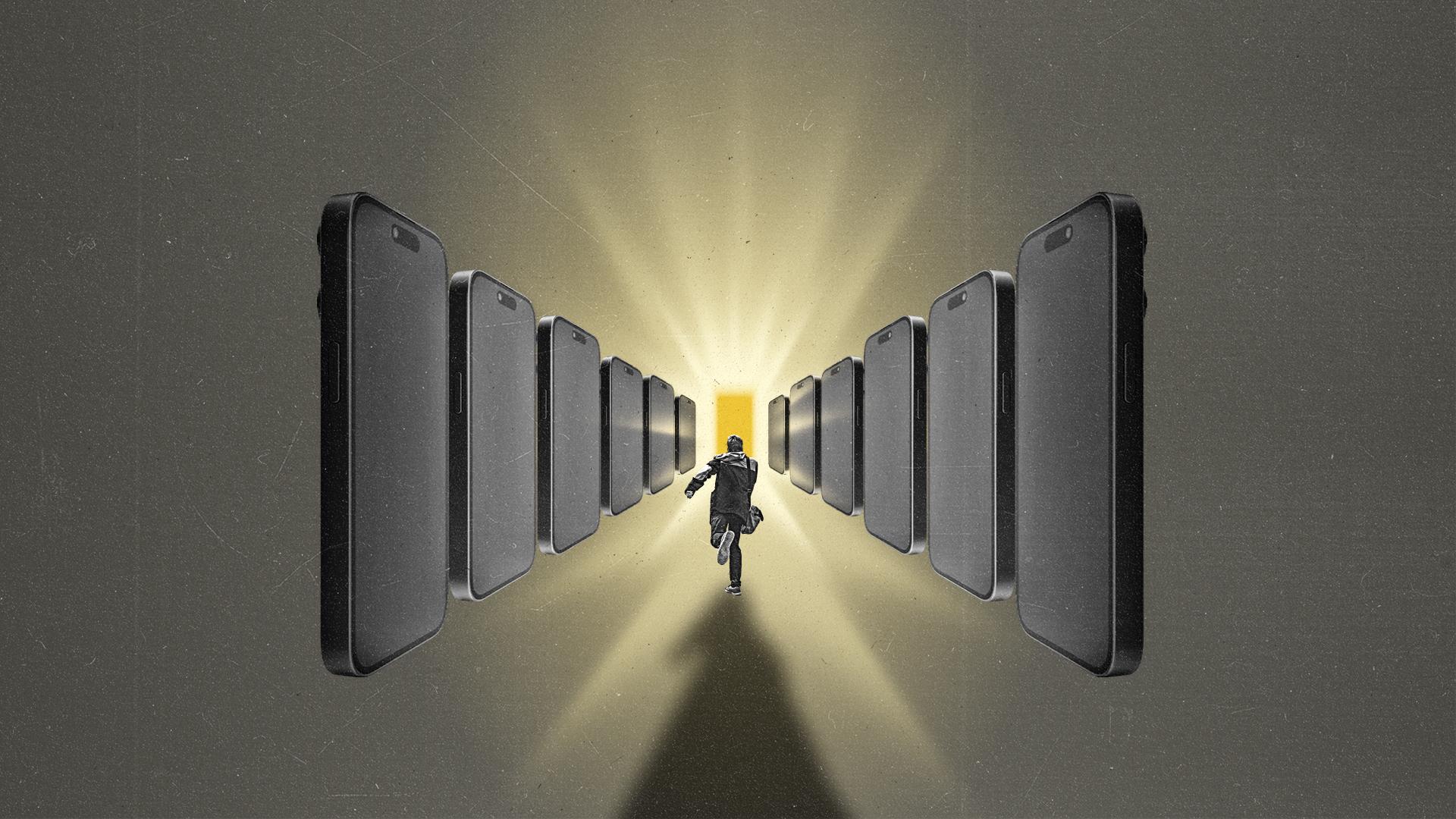 A person runs toward a light flanked by phones on either side.