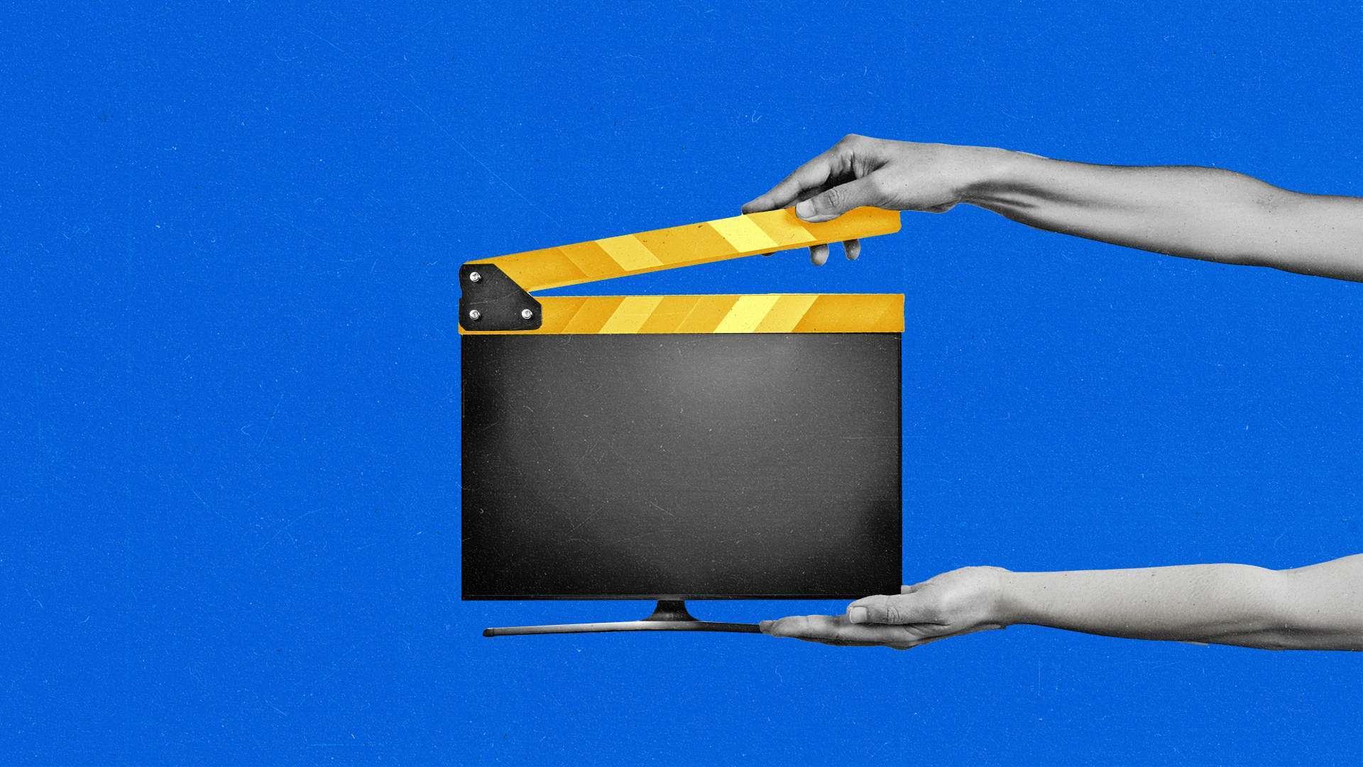 Two hands open a clapboard attached to the top of a connected TV.