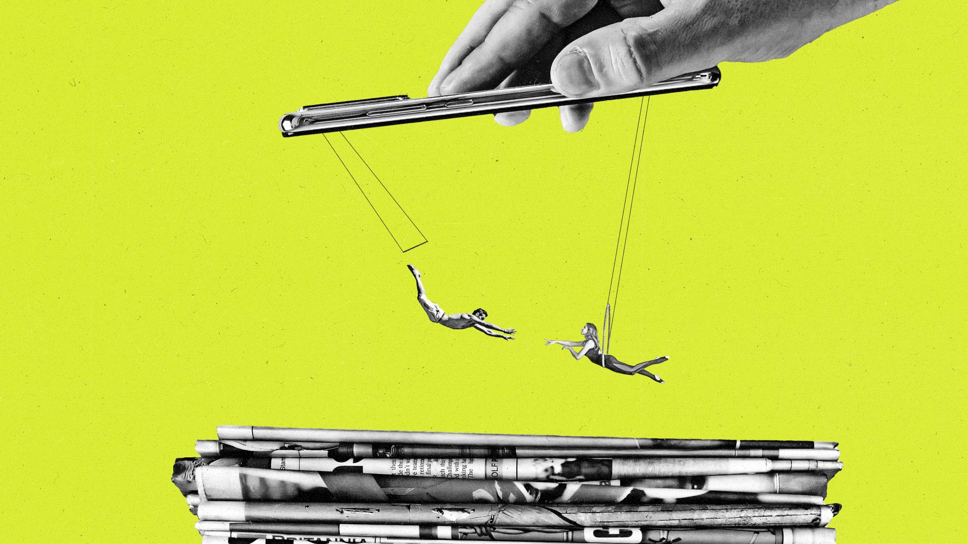 Two people trapeze from a cell phone over a stack of newspapers.