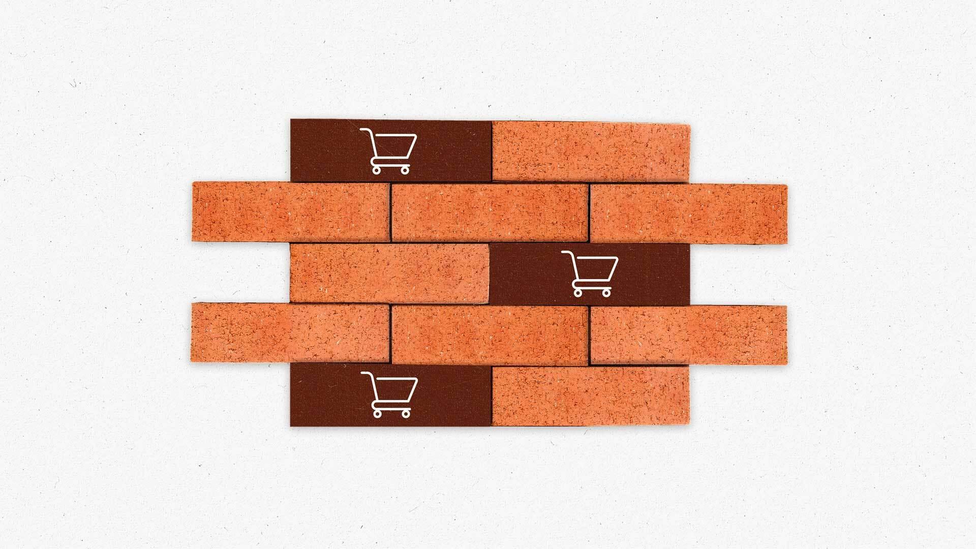 A section of wall made of bricks and brick-shaped buttons with shopping cart icons on them