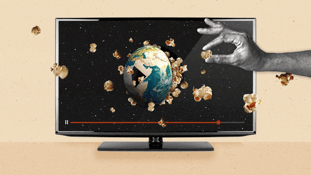 A globe-shaped play button on a Connected TV opens, spilling popcorn into the rest of the screen and beyond. A hand grabs one popcorn kernel.