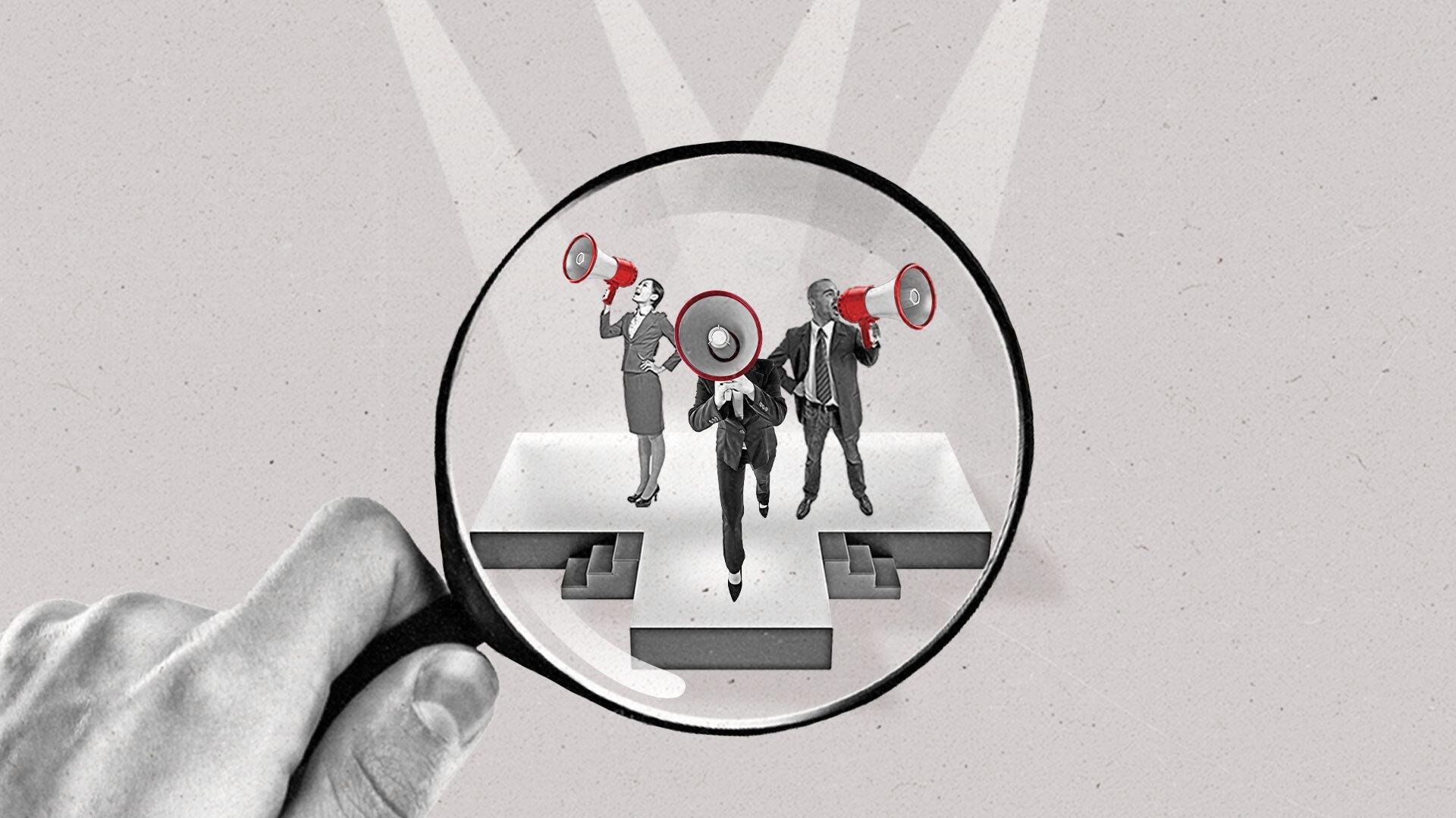 Three people are seen through a magnifying glass speaking using megaphones on a stage.