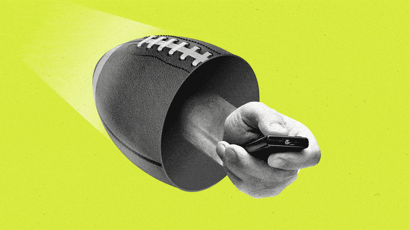 A hand with a streaming remote sticks out of a hollowed-out airborne spiraling football.