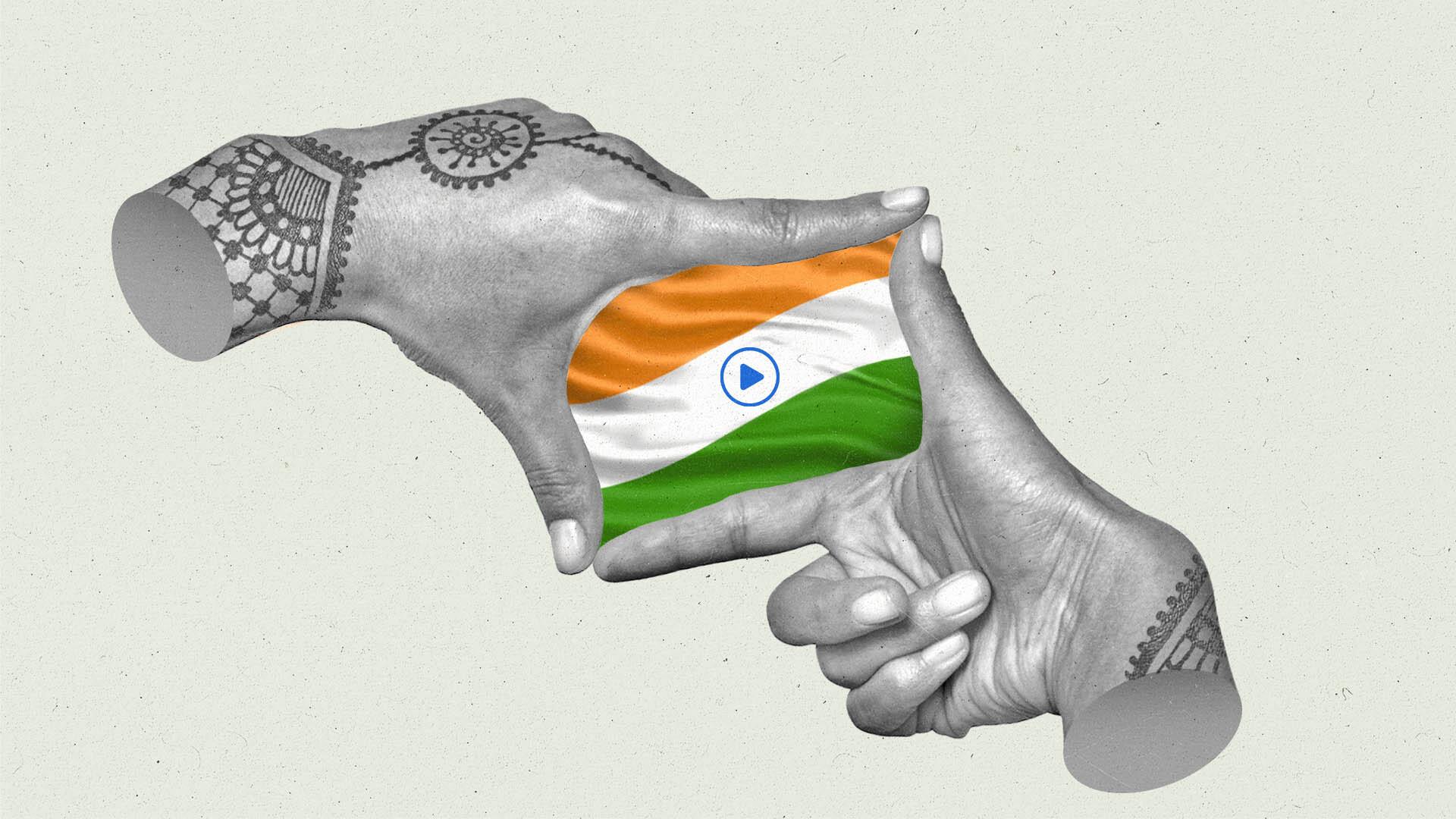 Two hands with henna tattoos form a viewfinder, with the flag of India and a central play button sitting in-between the fingers.