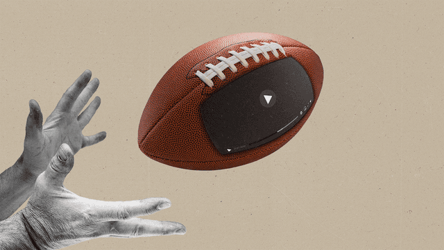 Hands reaching out to catch a football with a screen embedded in the side.