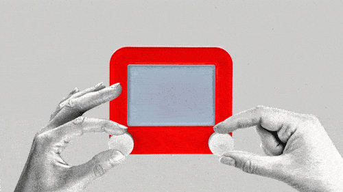 Two different hands create a finger cursor on an Etch-A-Sketch toy.