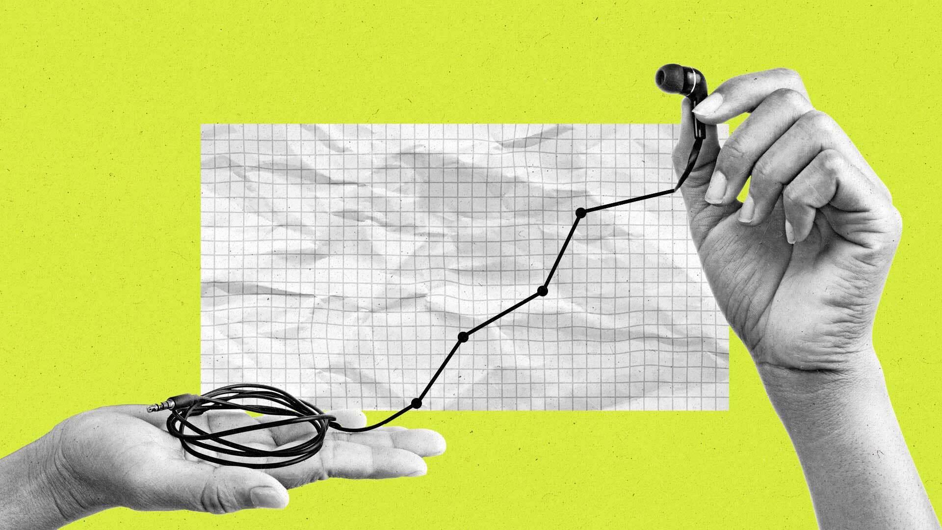 Two hands holding headphones form a line graph trending upwards out of the wire.