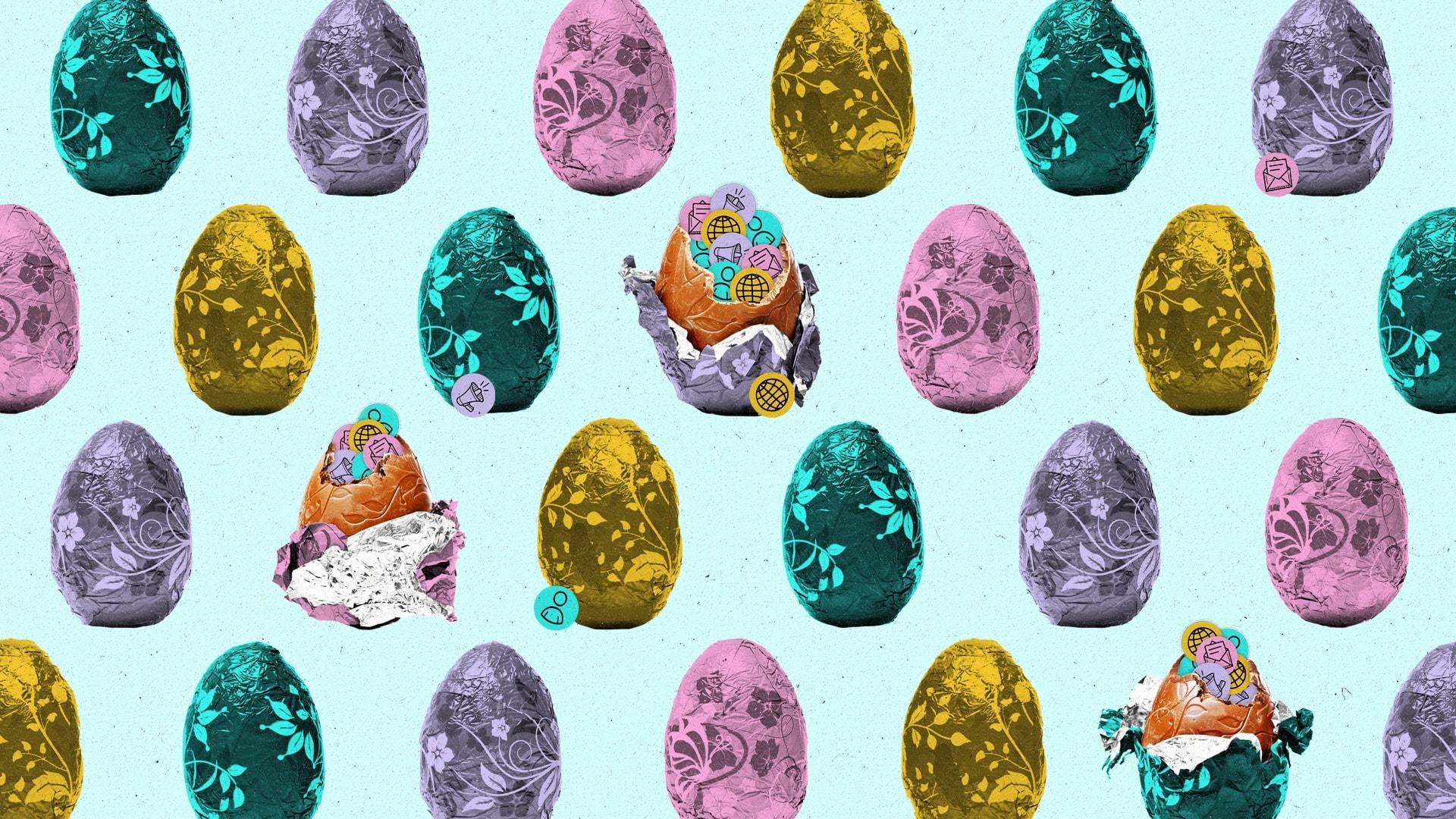 Multicolor chocolate easter eggs on a blue background.