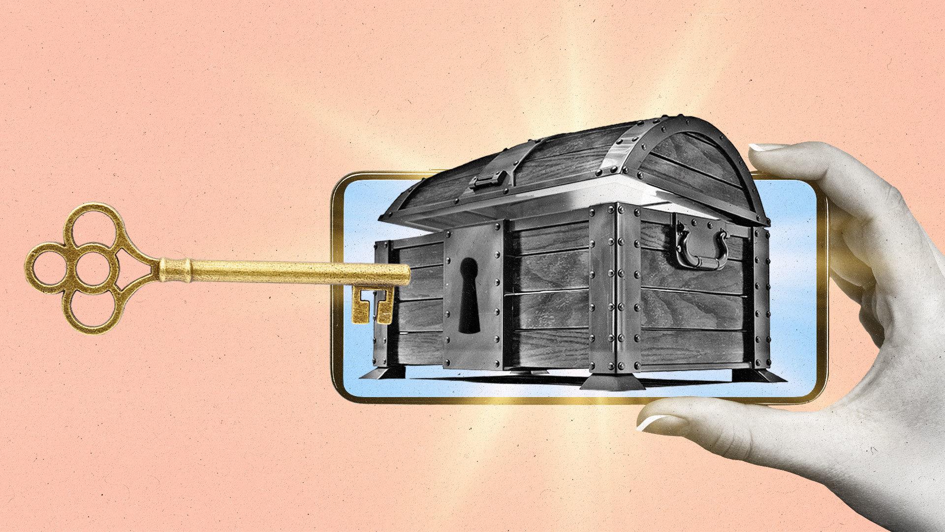 A mobile phone shows a wooden treasure chest with a gold key inserting into the key hole.