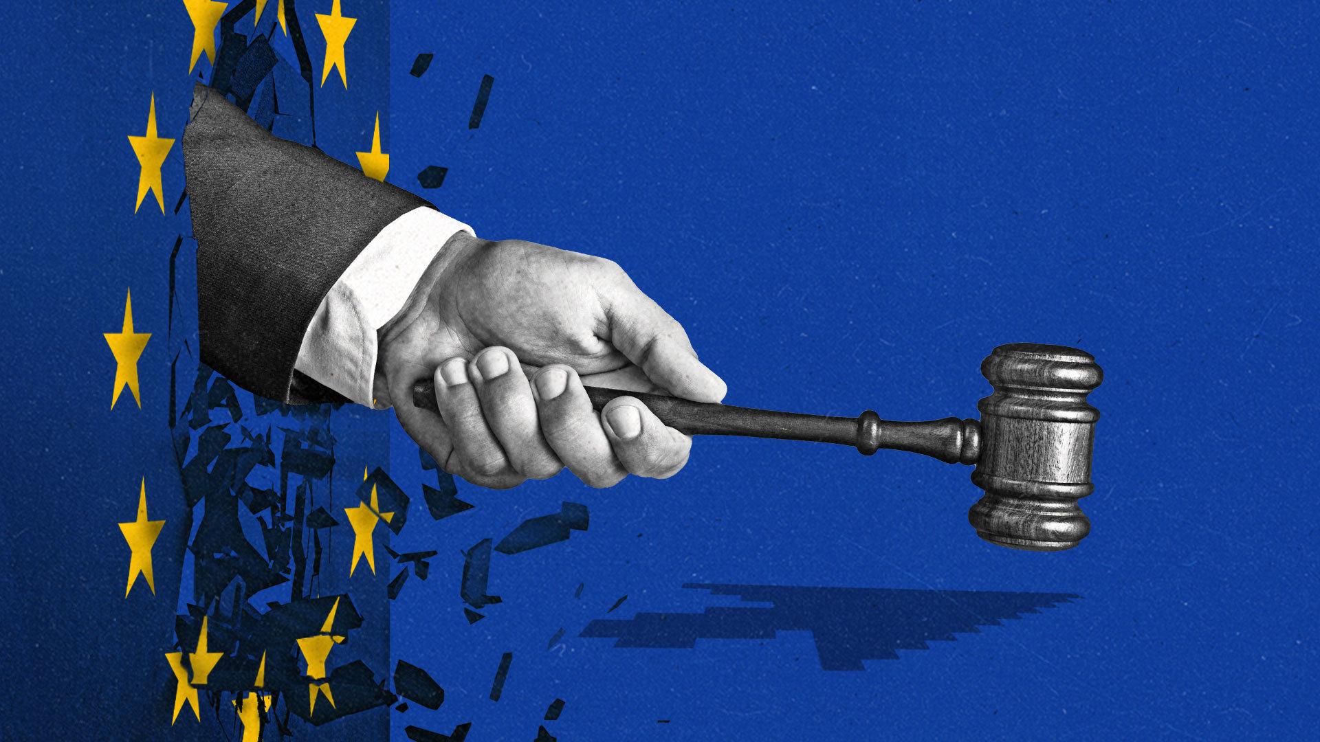 A hand holding a gavel smashes through a wall with the European Union flag printed on it. The shadow of the gavel forms the shape of an arrow cursor.