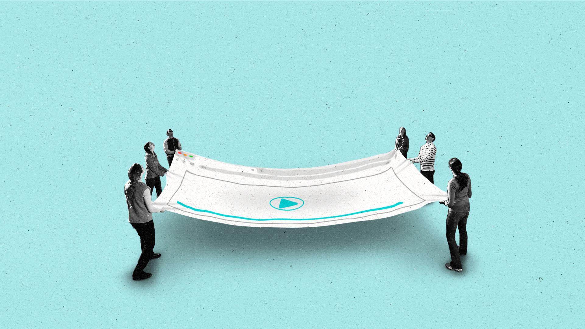 People hold a blanket with a streaming play screen on the sheet.