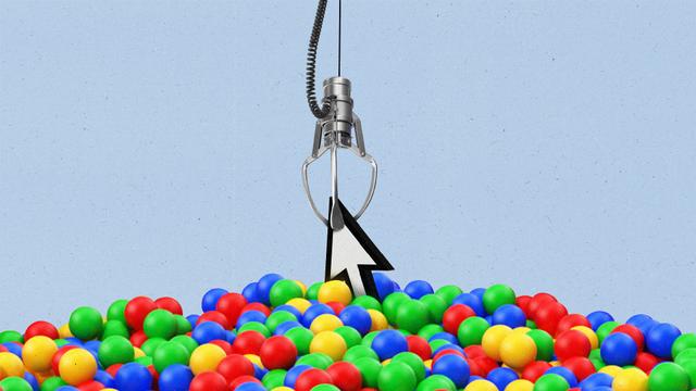 A claw machine claw pulling a cursor out of a ball pit filled with red, yellow, blue and green balls.