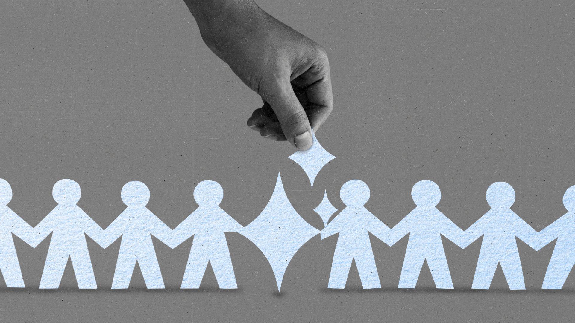 A hand reaching towards a line of paper people connected with paper AI sparkles.