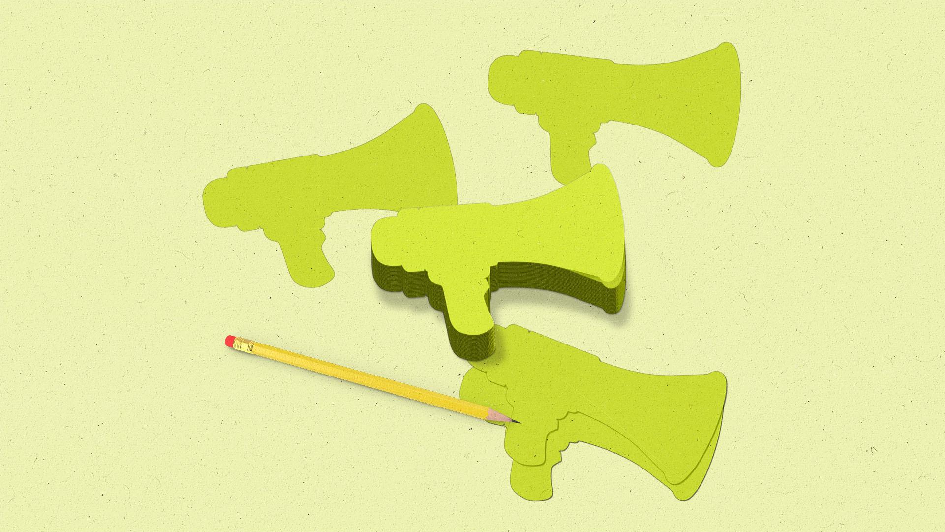 A stack of post it notes in the shape of a megaphone surrounded by notes and a pencil.