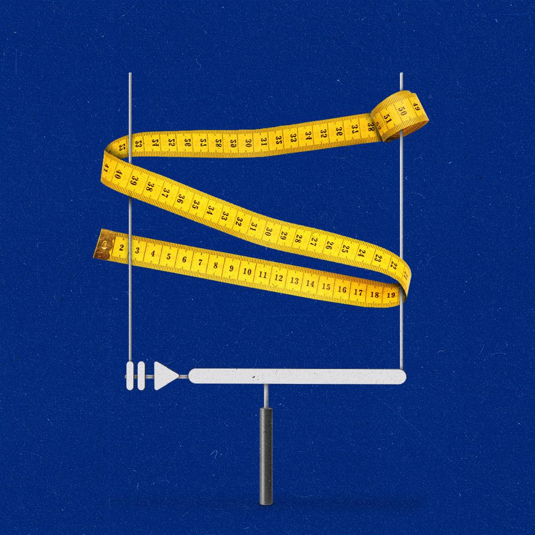 Measuring tape wrapped around goal posts with streaming UI.