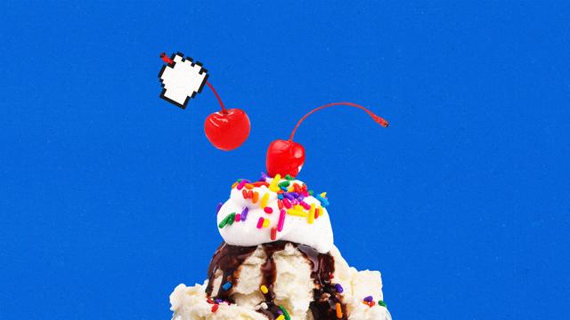 Cursor hand placing a second cherry on top of an ice cream sundae.