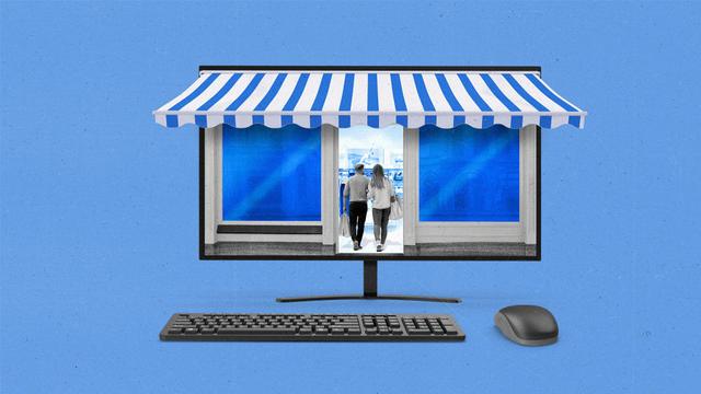 Computer monitor, mouse, and keyboard made to look like a store front with an awning as two shoppers enter.