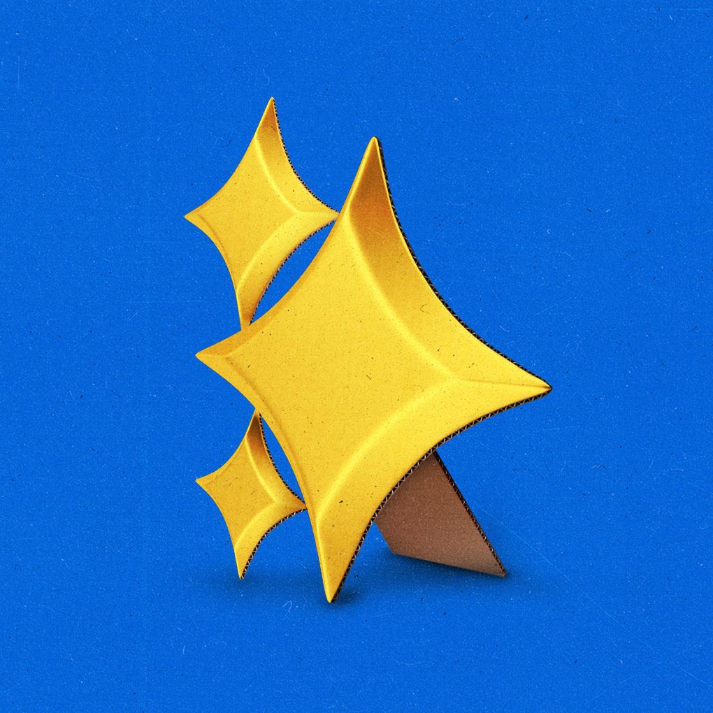 Cardboard cutouts of golden AI sparkles