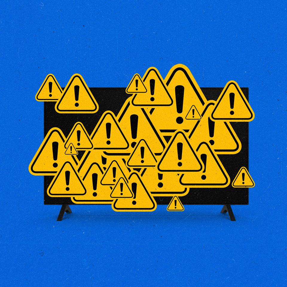 'ATTENTION' symbols stacked and crowded covering a TV screen.