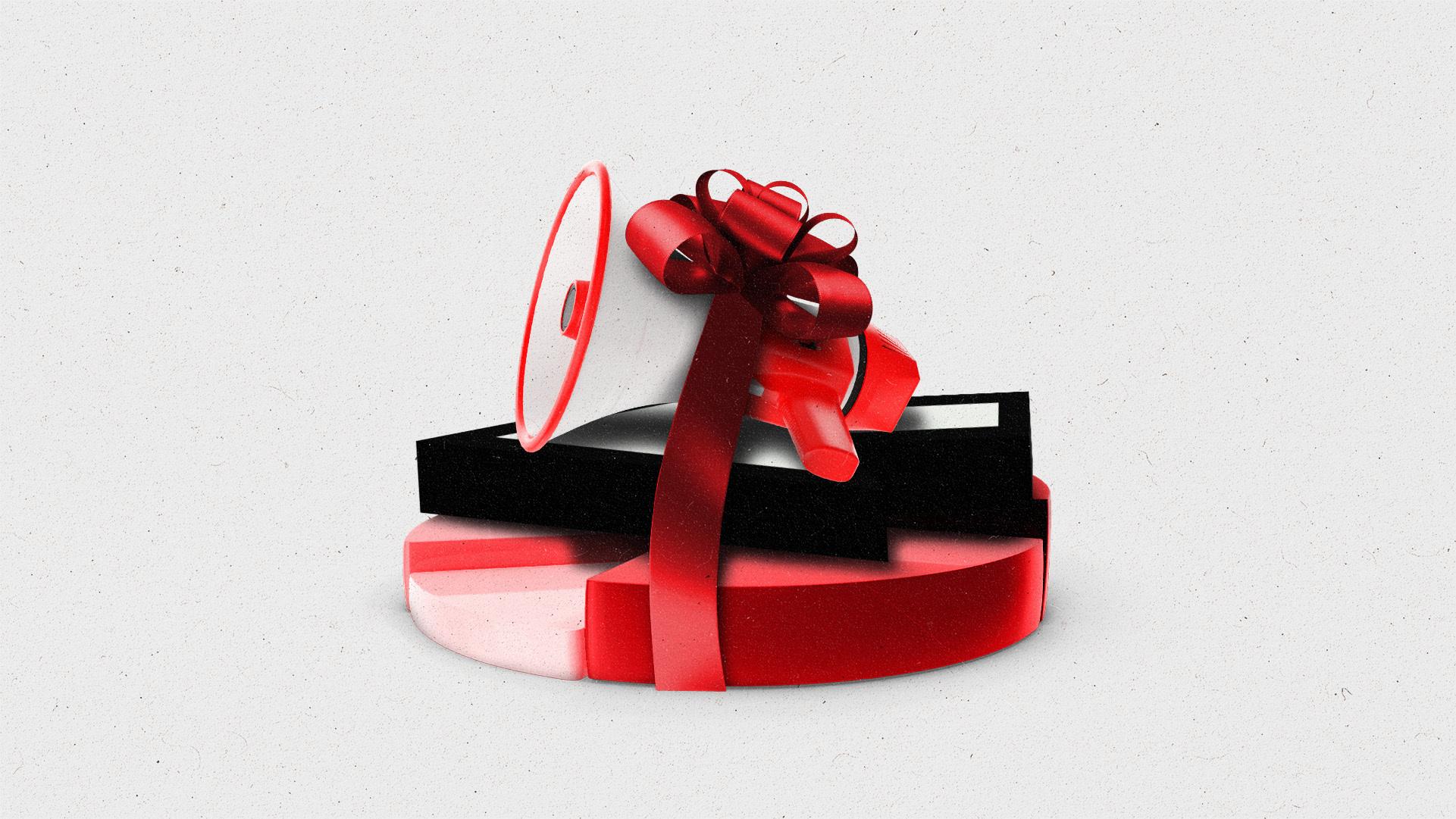 A megaphone, cursor, and pie chart stacked on top of each other and wrapped with a ribbon