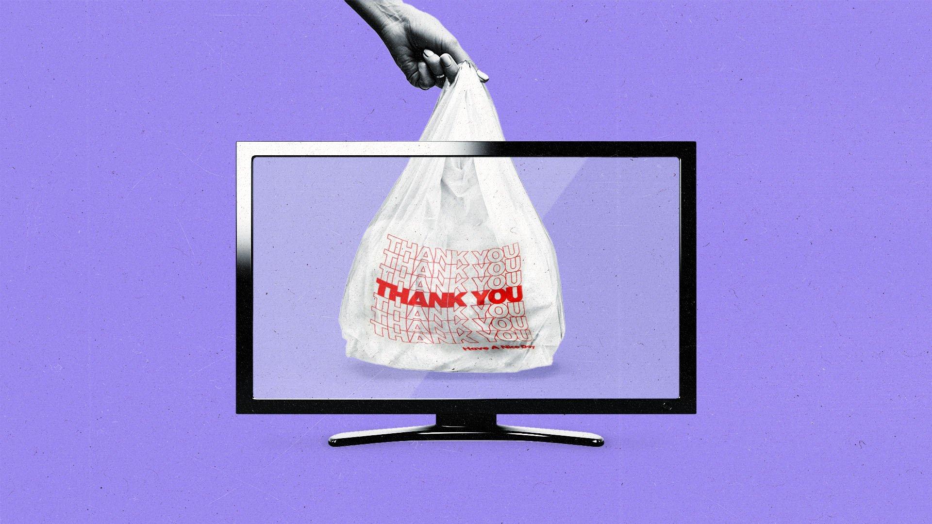 A hand holding a "thank you" plastic bag extending past the top of a television frame